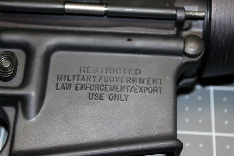 right side stamping: RESTRICTED MILITARY/GOVERNMENT LAW ENFORCEMENT/EXPORT USE ONLY